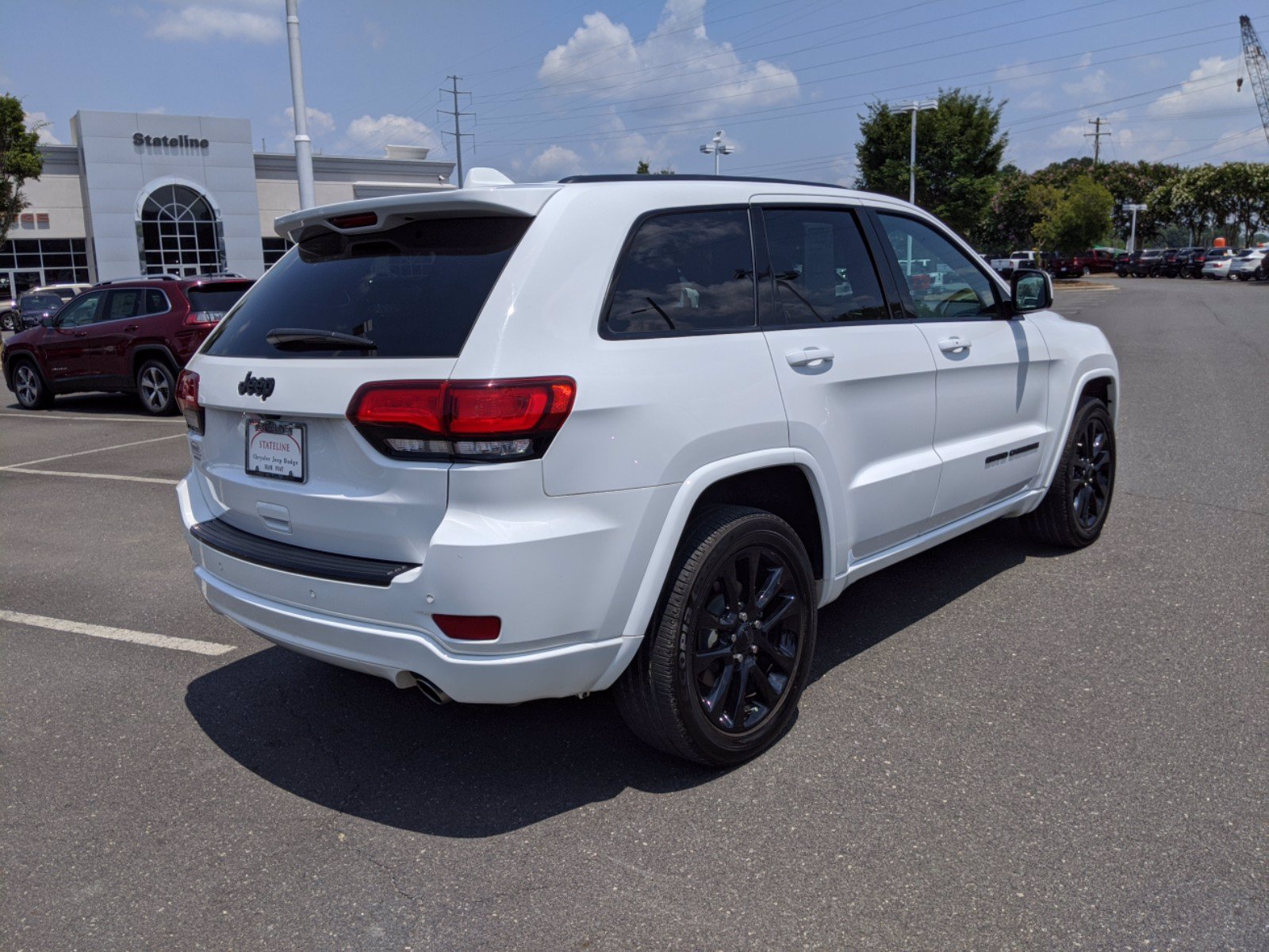 Pre-Owned 2018 Jeep Grand Cherokee Altitude RWD Sport Utility