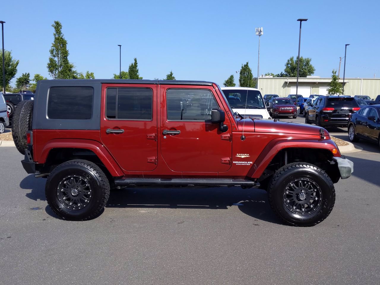 PreOwned 2009 Jeep Wrangler Unlimited Sahara RWD Convertible