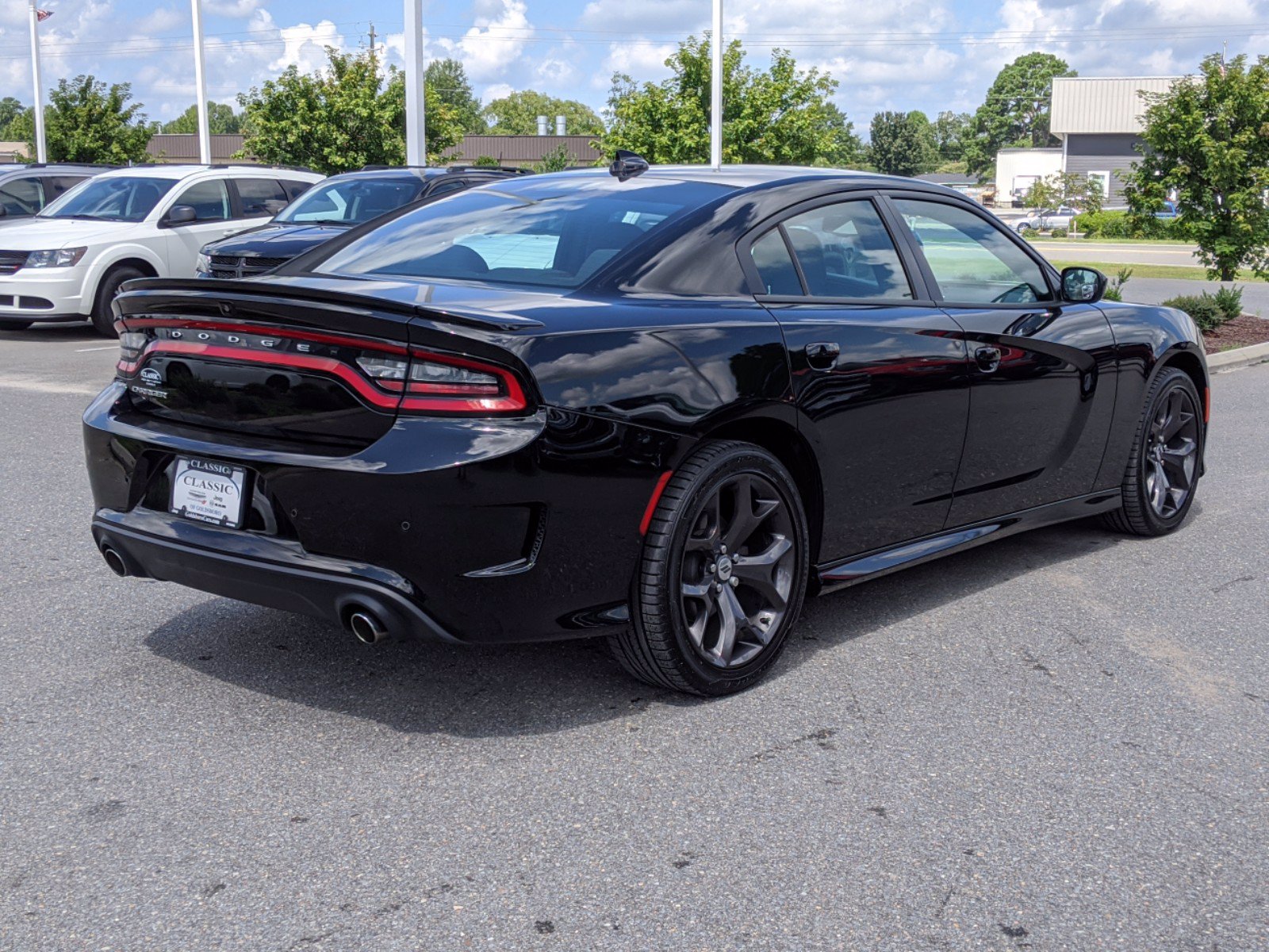 Pre-Owned 2018 Dodge Charger SXT Plus RWD 4dr Car